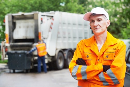 Construction site with builders waste being cleared